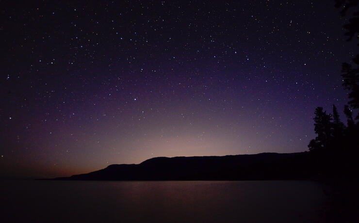 Stars in a dark purple night sky