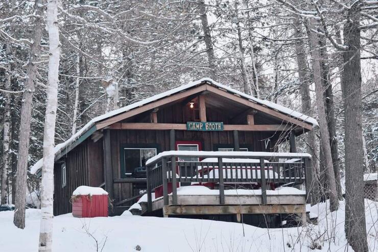 A cabin in the snowy woods at Mattawa River Resort