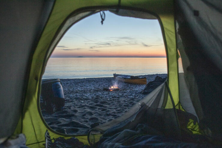 View of lake though a tent