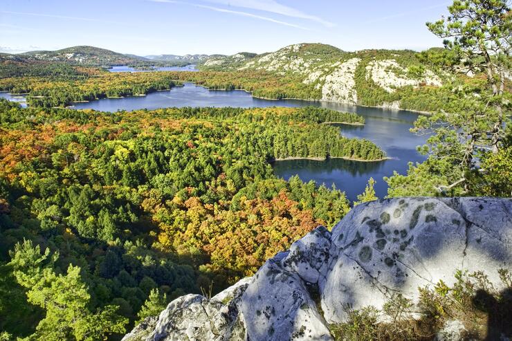 Viewpoint overlooking lakes and white mountains.