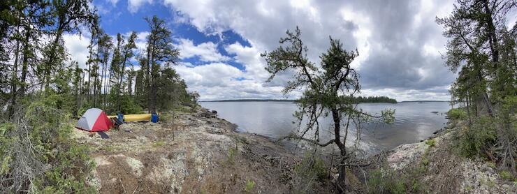 Camp set up on shore.