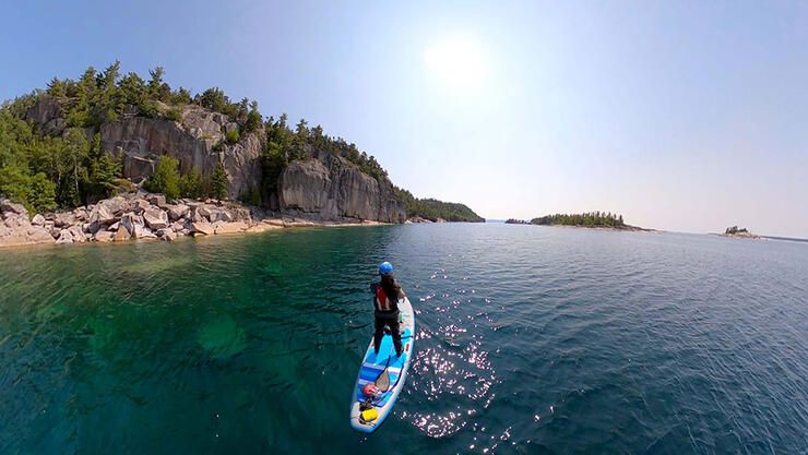 woman paddleboarding at Mississagi Provincial Park