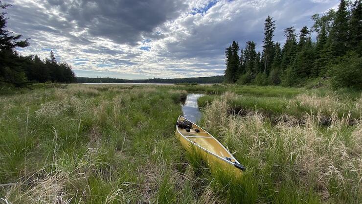 Canoe on a creek.