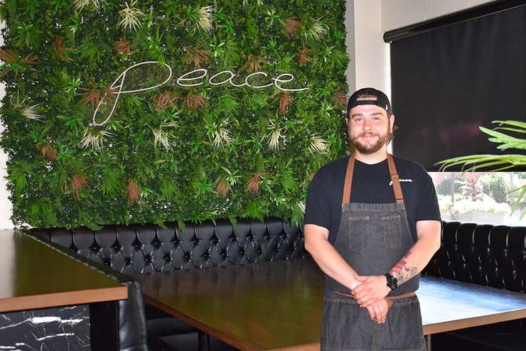 man standing in restaurant