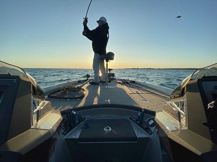 angler casting from boat