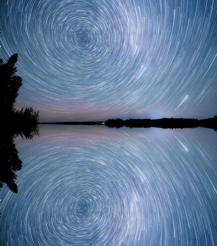 Star trails reflecting off Lake of the Woods