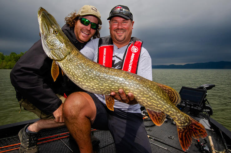 two anglers fishing northern pike