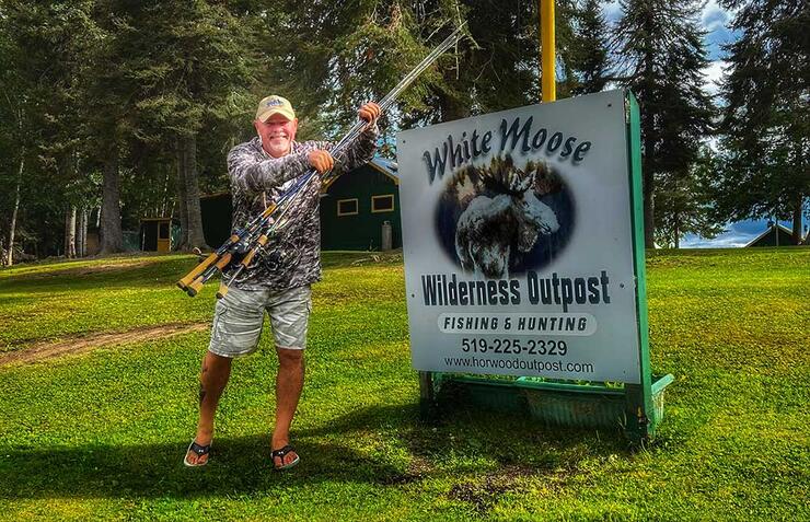 white moose wilderness outpost sign
