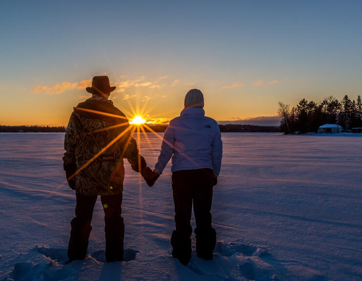 Couples Ice Fishing on Lake Nosbonsing