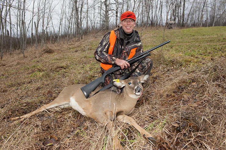 hunter with harvested deer