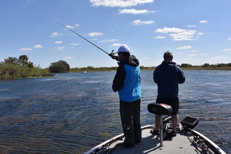 anglers casting from a boat