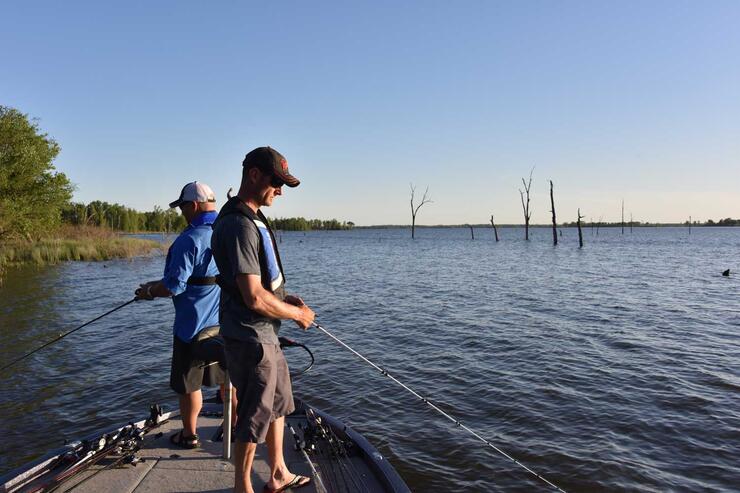 anglers casting from a boat