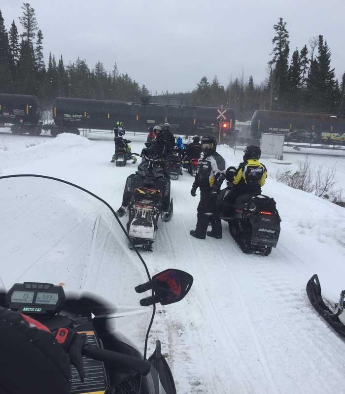 group of snowmobilers