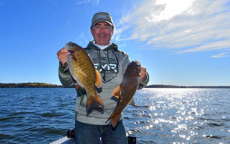 angler holding ontario bass