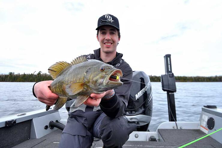 angler fishing smallmouth bass