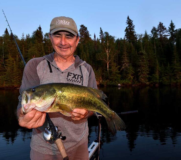 angler with bass