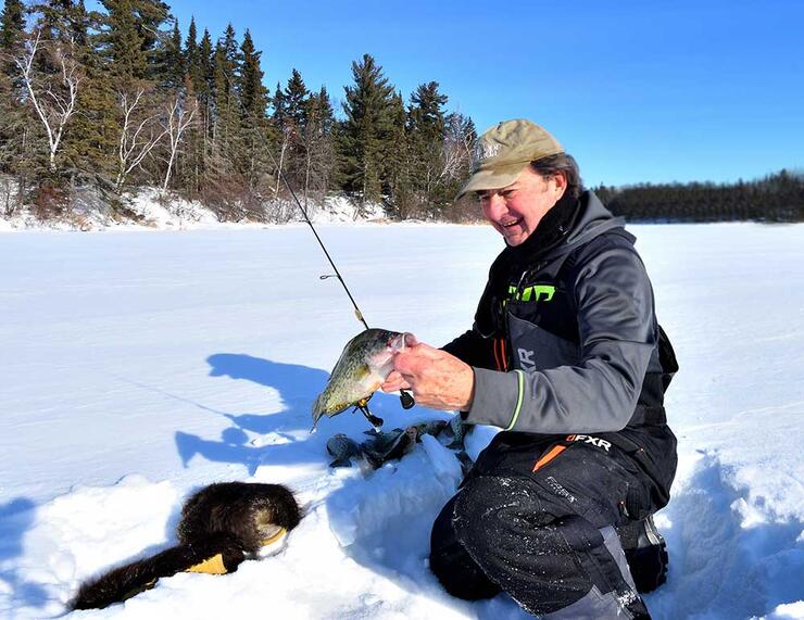 angler ice fishing