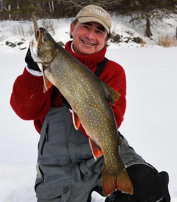 ice angler with trout