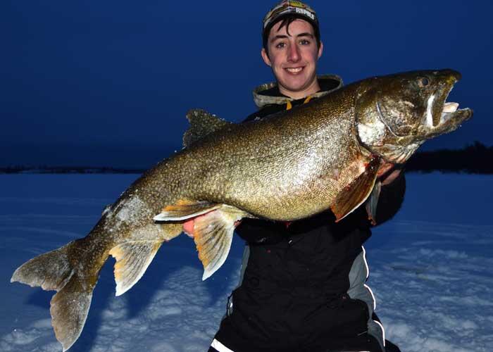 ice angler with trout