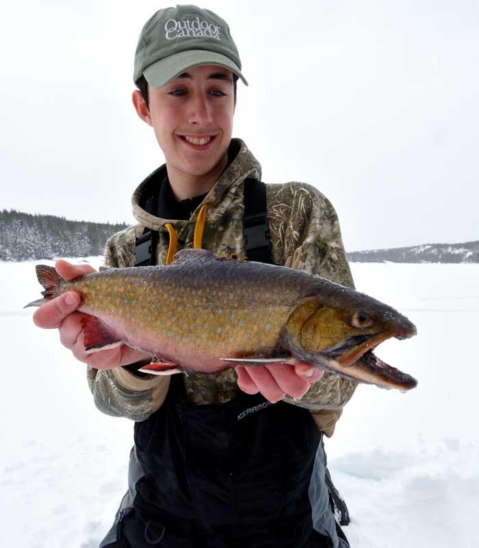 ice angler with speckled trout