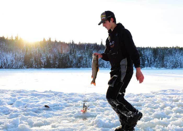 young angler ice fishing