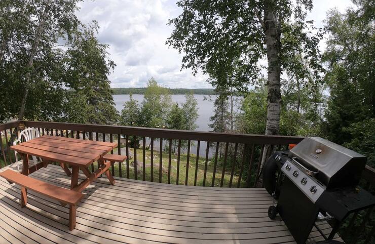 Green Wilderness Lodge cabin deck