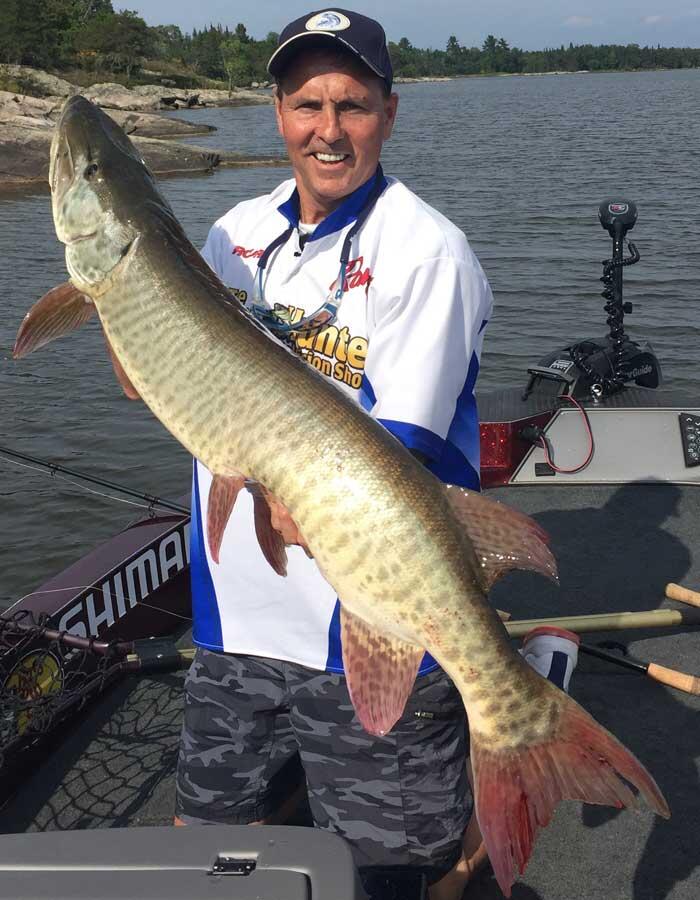 jim saric the musky hunter holding ontario caught muskie