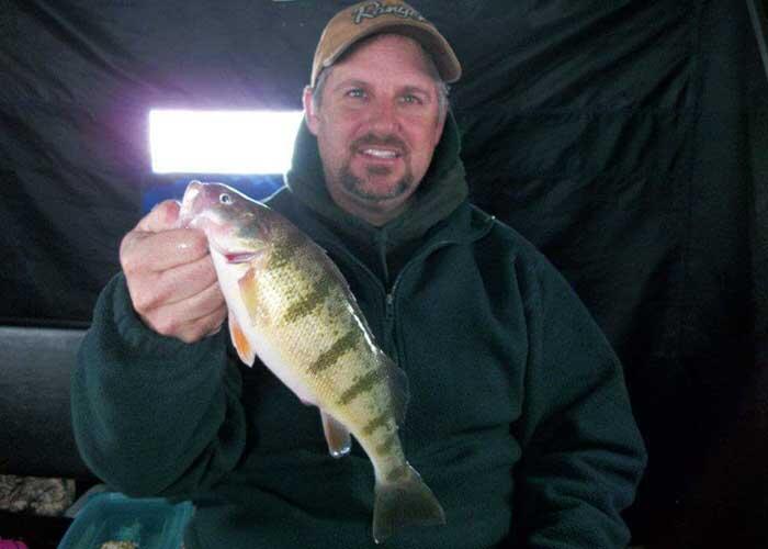 angler holding perch