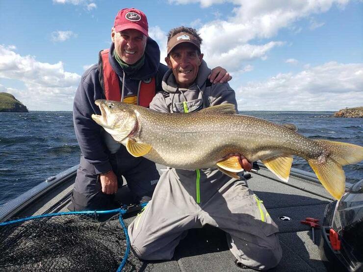 2 anglers with lake trout nipigon