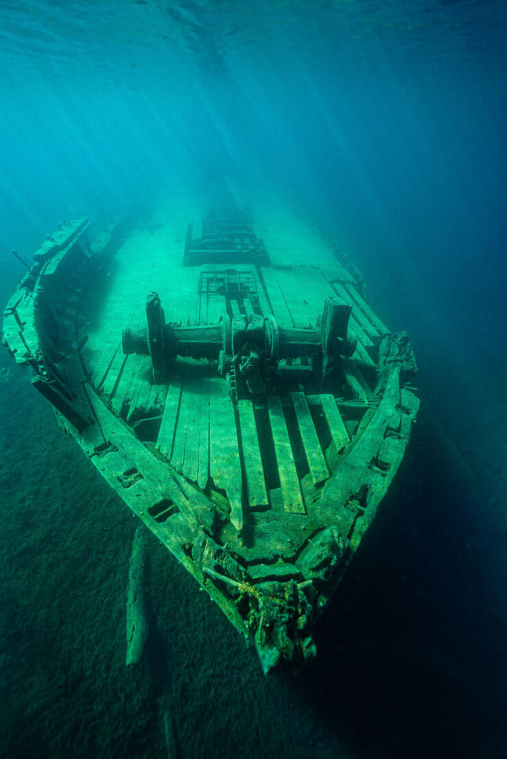 a shipwreck sits underwater in Ontario's Great Lakes