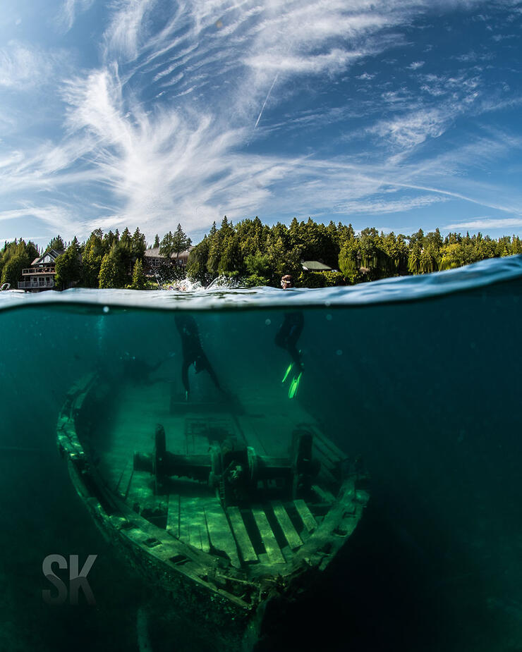 view above and below the surface at a Great Lakes shipwreck