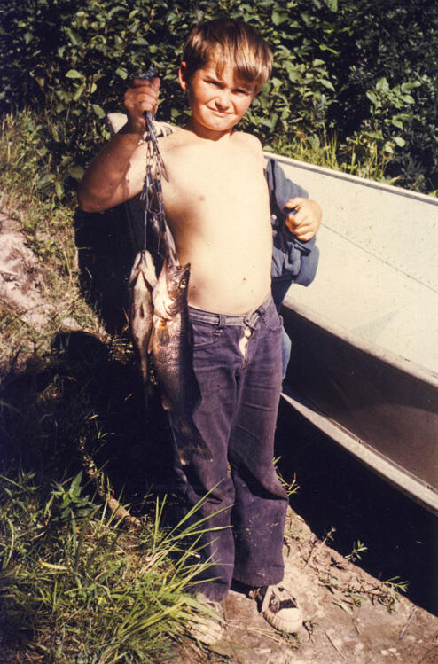 young boy angler fishing walleye