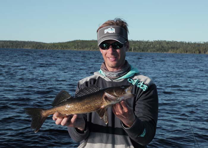 troy lindner holding ontario walleye