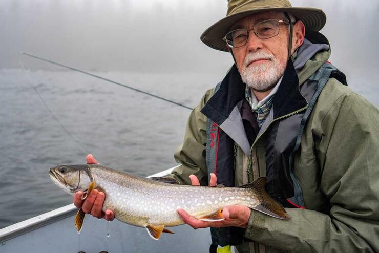 angler fishing trout